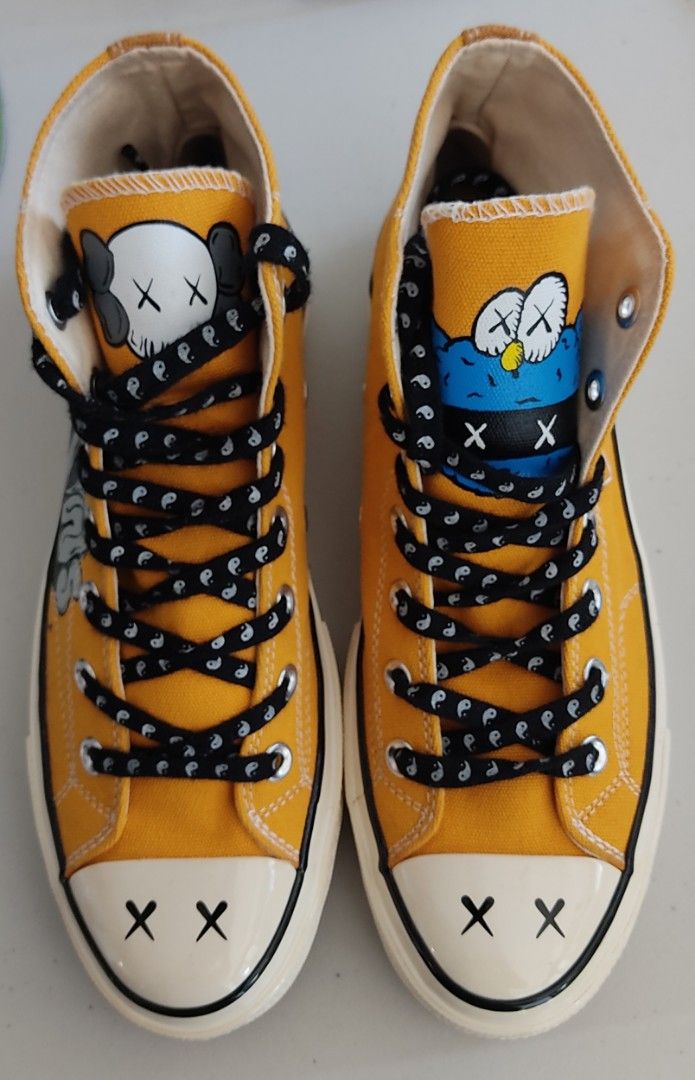 Converse x kaws price hot sale