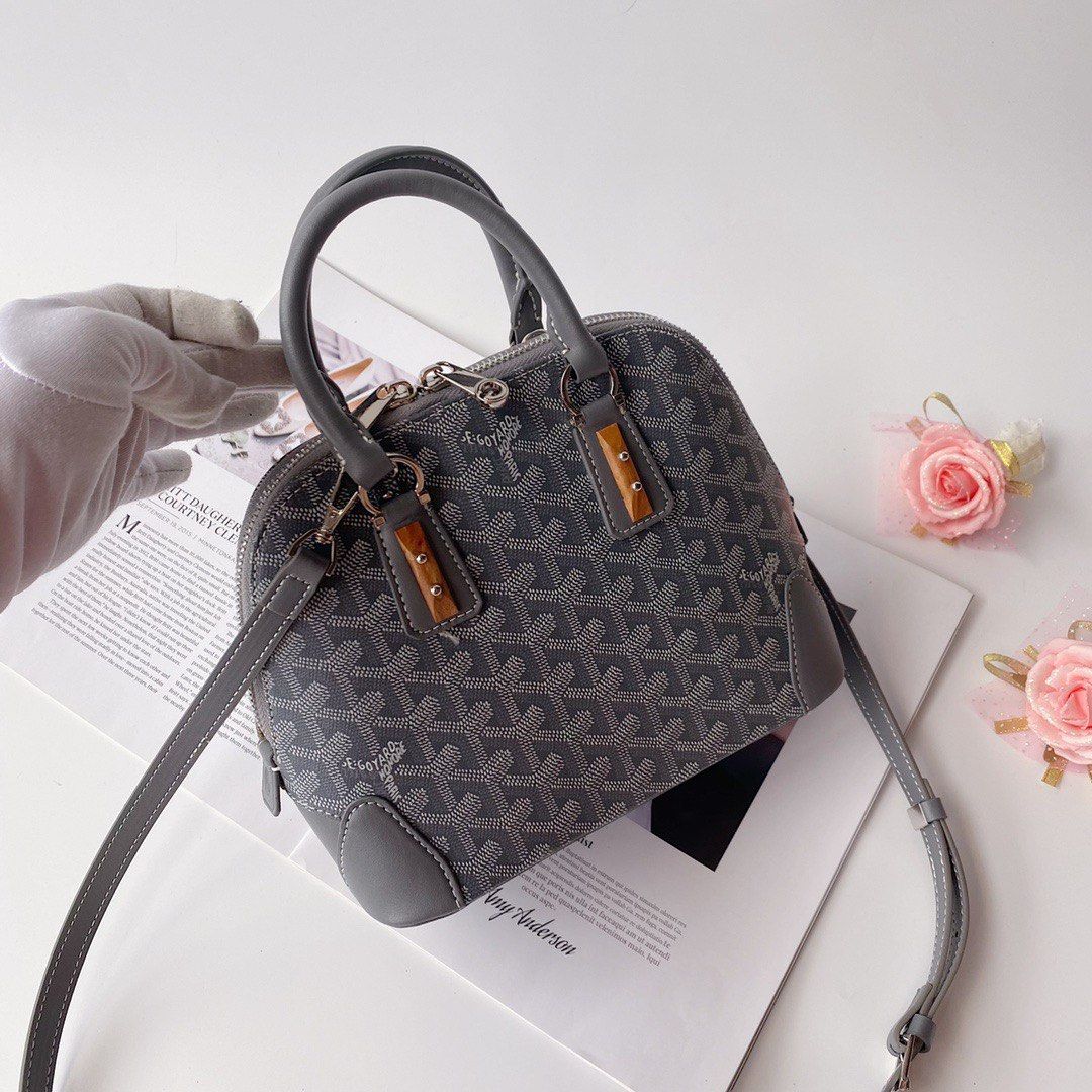 Crafted from Goyardine, the Goyard Mini Vendome is the ideal crossbody