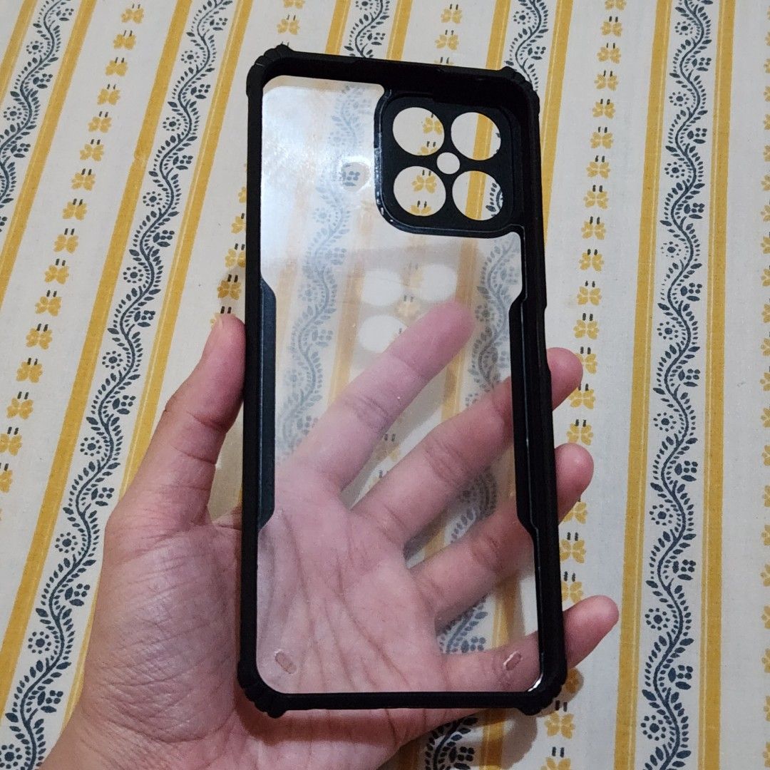 Honor X8 shockproof case (Category: Cases & Sleeves) located in Guagua. Submitted by v.as_ey (Listing ID 1238080247, Image 2). Description: - Bought it from Shopee for a different unit (I didn't know that the Honor X8 is different from the Honor 8X 😅) - Brand new and unused (still has the protective films for the clear part).