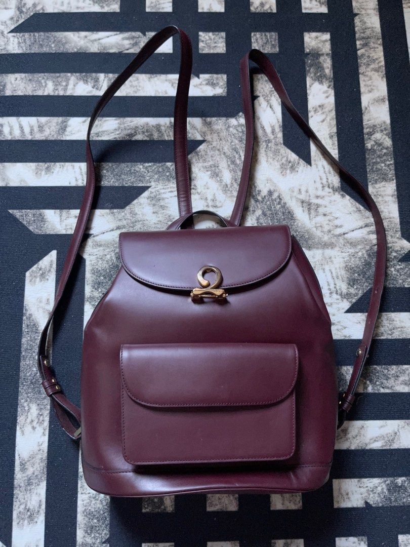 LOUIS QUATORZE MAROQUINERIE BACKPACK (Category: Backpacks) located in Cavite. Submitted by declutterqueen_ph (Listing ID 1237522938, Image 1). Description: ✅ STAND ALONE BAG ✅ ADJUSTABLE STRAP. CLEAN INSIDE AND OUT ✅ SEE LAST PIC FOR FLAW BUT THE BAG IS STILL FUNCTIONAL. ✅ PRELOVED. STILL PRETTY IN PERSON. RFS: DECLUTTERING. I WAS A COLLECTOR OF LQ MAROQUINERIE BAG BUT I NEED SPACE FOR NEW ITEMS. ☺️.
