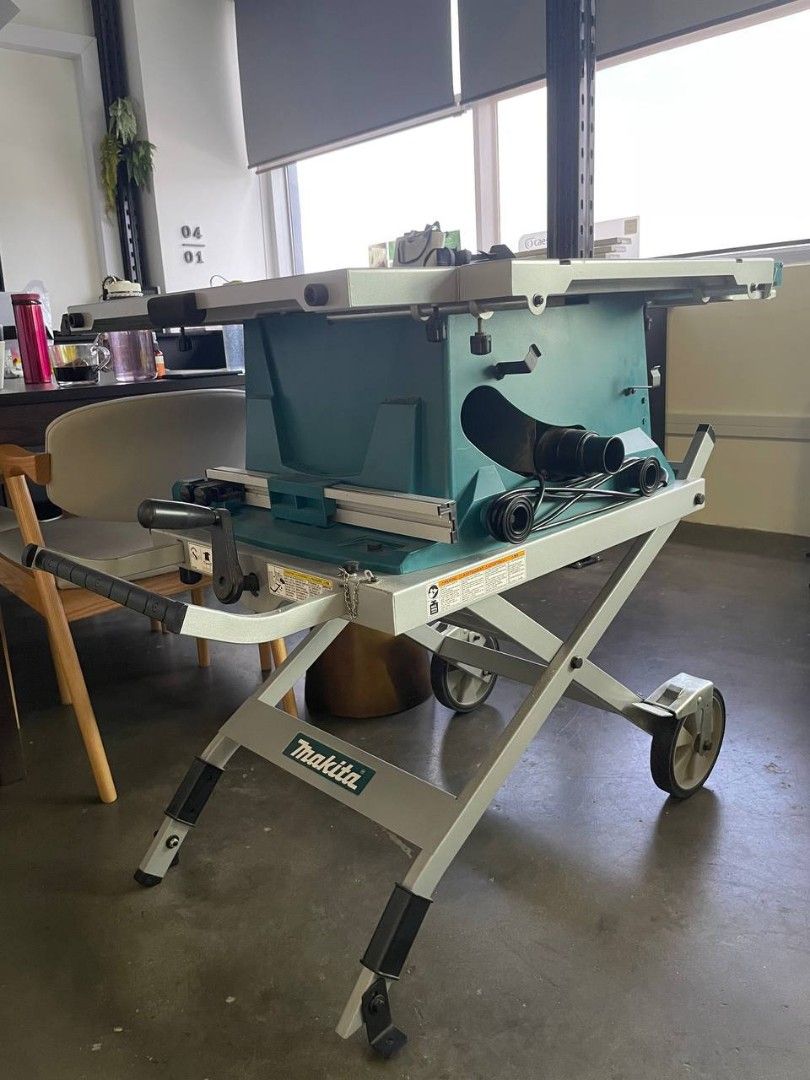 Makita MLT100 table saw with roller stand, Furniture & Home Living