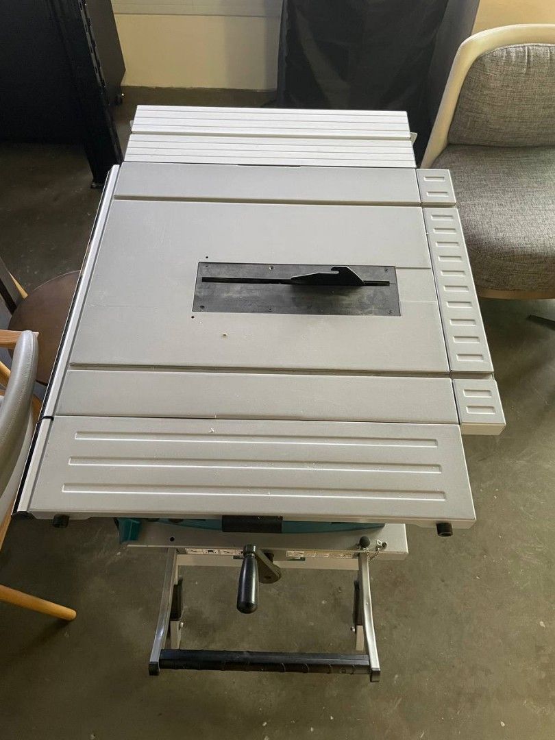 Makita MLT100 table saw with roller stand, Furniture & Home Living