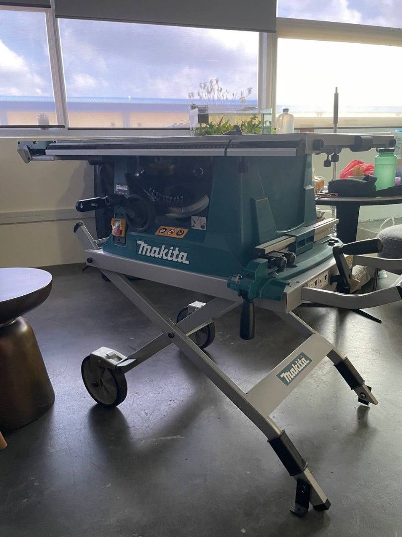 Makita MLT100 table saw with roller stand, Furniture & Home Living