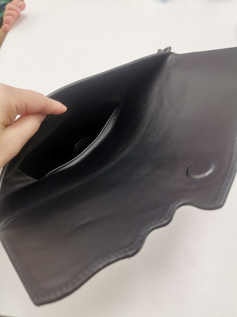 Pochette moschino 2025 homme