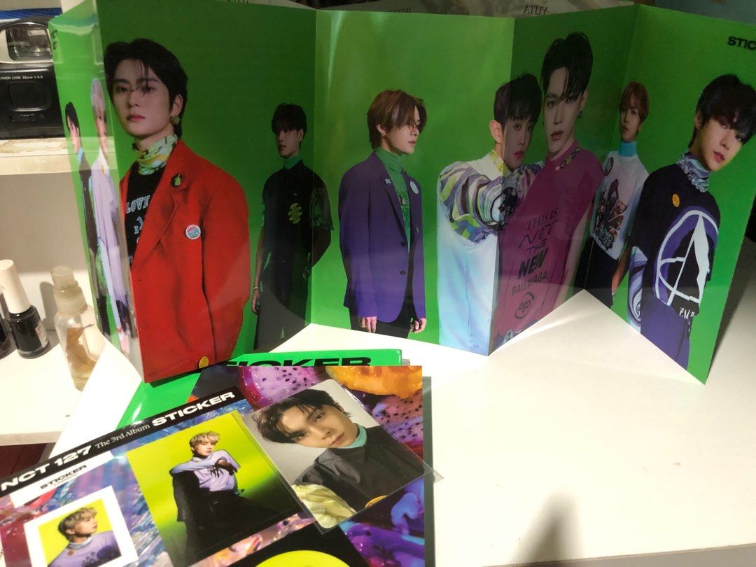 NCT 127 Sticker Album (Category: K-Wave Merchandise) located in Caloocan City. Submitted by cskhaela (Listing ID 1238146223, Image 3). Description: Bought this for 500 sa Twitter before. - Album itself - CD - Sticker (I pulled Jungwoo) - Poster - Photocard (I pulled Johnny) .
