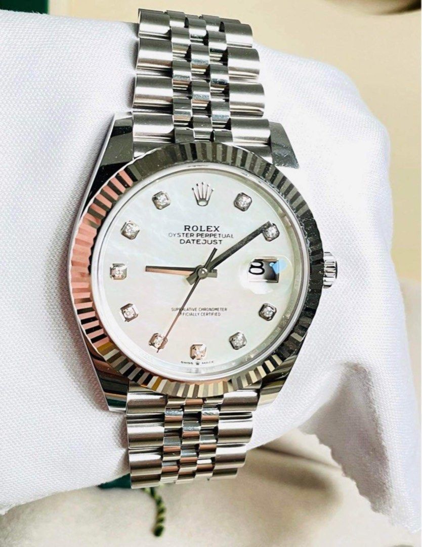 Rolex 2021 RARE Datejust 41 MOP (Category: Luxury Watches) located in Pasig City. Submitted by Watchaholics (Listing ID 1238098772, Image 2). Description: Rolex 2021 RARE Datejust 41 MOP -Ref 126334 -year model 2021 -RARE model -9.8/10 condition (almost new) -Complete Full Set For 965k You may DM or contact @ 09615077138 Thanks admin😉.