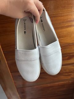Auth Lacoste white slip on shoes