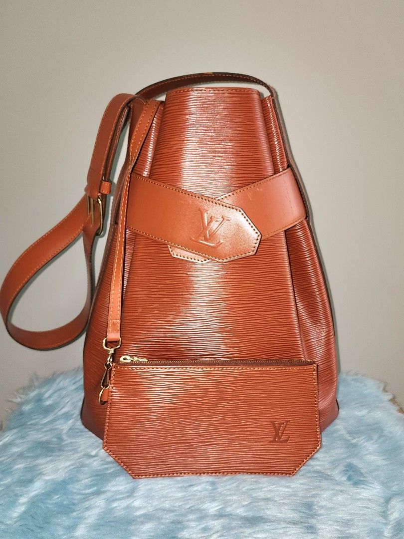 Buy 1 Take 1] Authentic Vintage Louis Vuitton Sac de Paul Bucket Bag in Epi  Leather with Free LV Epi Card Case, Luxury, Bags & Wallets on Carousell