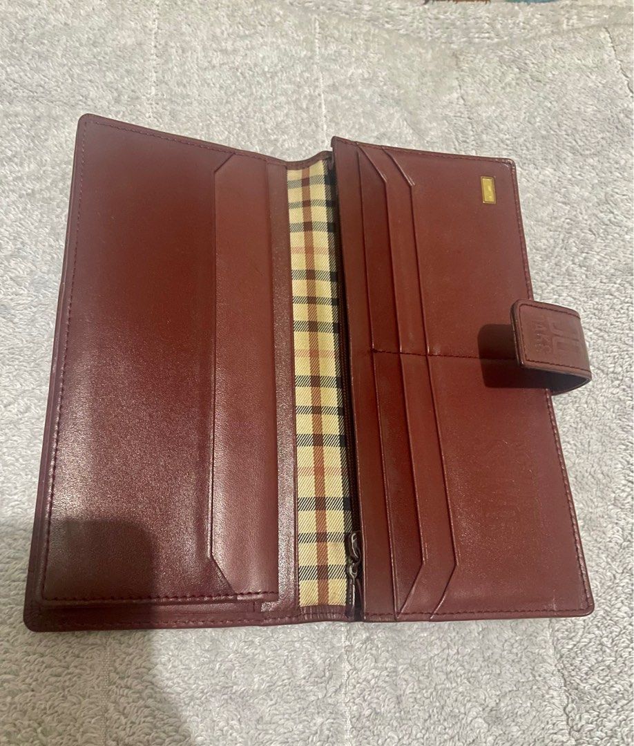 Daks trifold long wallet (Category: Luxury Bags & Wallets) located in San Pablo. Submitted by prelovedbymistyblue (Listing ID 1238384031, Image 3). Description: Super nice trifold Daks wallet. Has many compartment and card slots. Made up of canvass and leather. Main flaw: some ink stain and some dirt and fading on the canvass of the wallet. Minimal rub on the right side of card holder. Selling low for 600. .