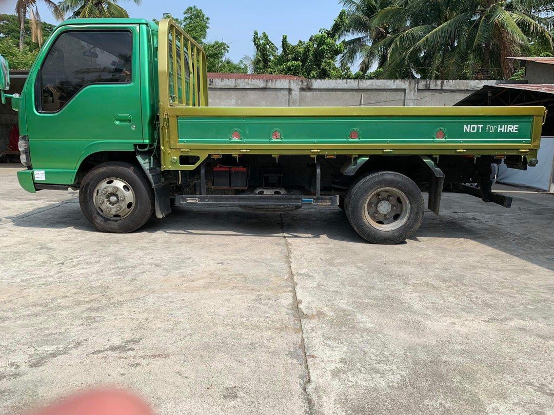 Isuzu ELF wide (Category: Heavy Vehicles) located in Makati City. Submitted by rochellegasangue (Listing ID 1238396297, Image 3). Description: Isuzu ELF wide NPR Year 2015 4HL 1, turbo intercooler, 12 ft dropside, left spring front & back with auxiliary spring 6 wheeler, 6 stud, automatic/manual transmission, diesel 1st owner, in running condition, good as new, no repairs Vehicle available for viewing at Purok 1, Baloc, Sto.Domingo, Nueva Ecija C
