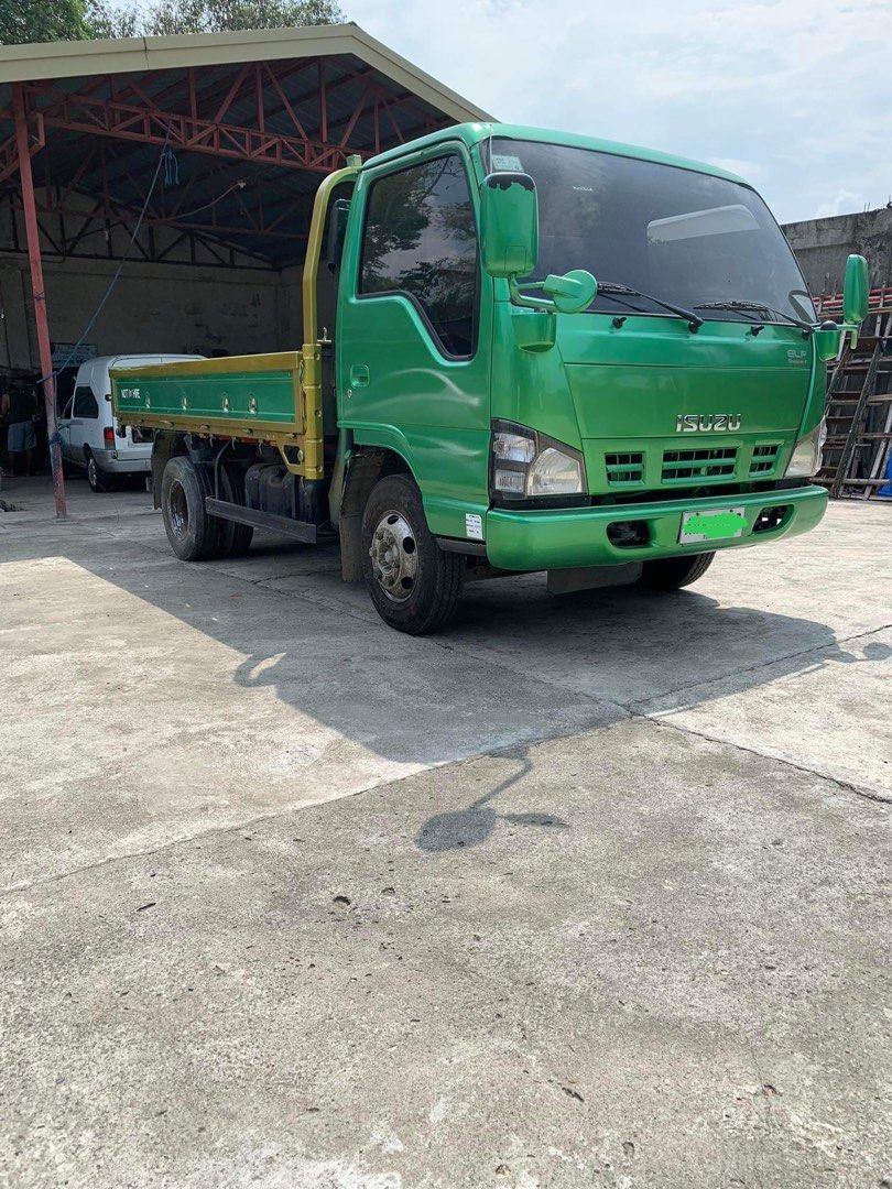 Isuzu ELF wide (Category: Heavy Vehicles) located in Makati City. Submitted by rochellegasangue (Listing ID 1238396297, Image 2). Description: Isuzu ELF wide NPR Year 2015 4HL 1, turbo intercooler, 12 ft dropside, left spring front & back with auxiliary spring 6 wheeler, 6 stud, automatic/manual transmission, diesel 1st owner, in running condition, good as new, no repairs Vehicle available for viewing at Purok 1, Baloc, Sto.Domingo, Nueva Ecija C