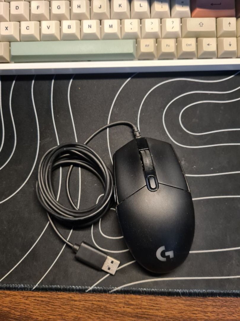 Logitech g102 | Battle Scarred (Category: Mouse & Mousepads) located in Pasay City. Submitted by jame.yy (Listing ID 1238326014, Image 1). Description: Logitech G102 Lightsync gaming Mouse (Black) Issues: double clicks sometimes • Height: 116.6 mm • Width: 62.15 mm • Depth: 38.2 mm • Weight: 85 g, (mouse only) • Cable Length: 2.1 m • LIGHTSYNC RGB lighting • 6 programmable buttons • Resolution: 200 – 8,000 DPI.