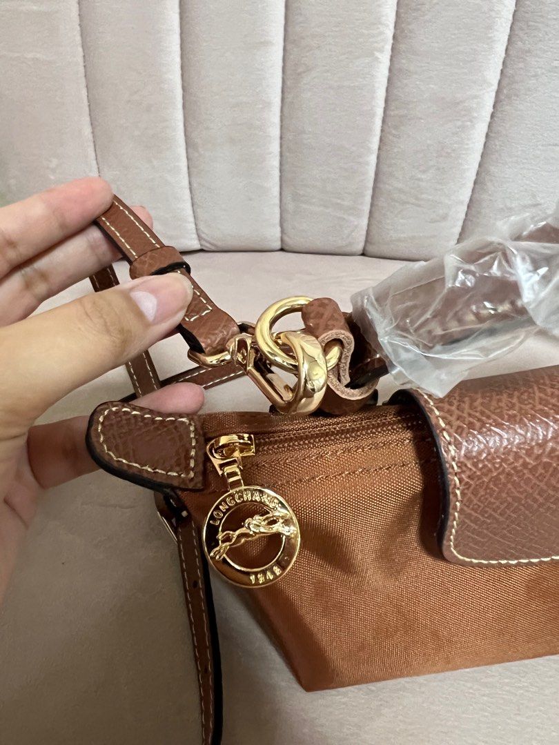 Longchamp Le Pliage Original Pouch with Handle in Cognac, Luxury, Bags &  Wallets on Carousell