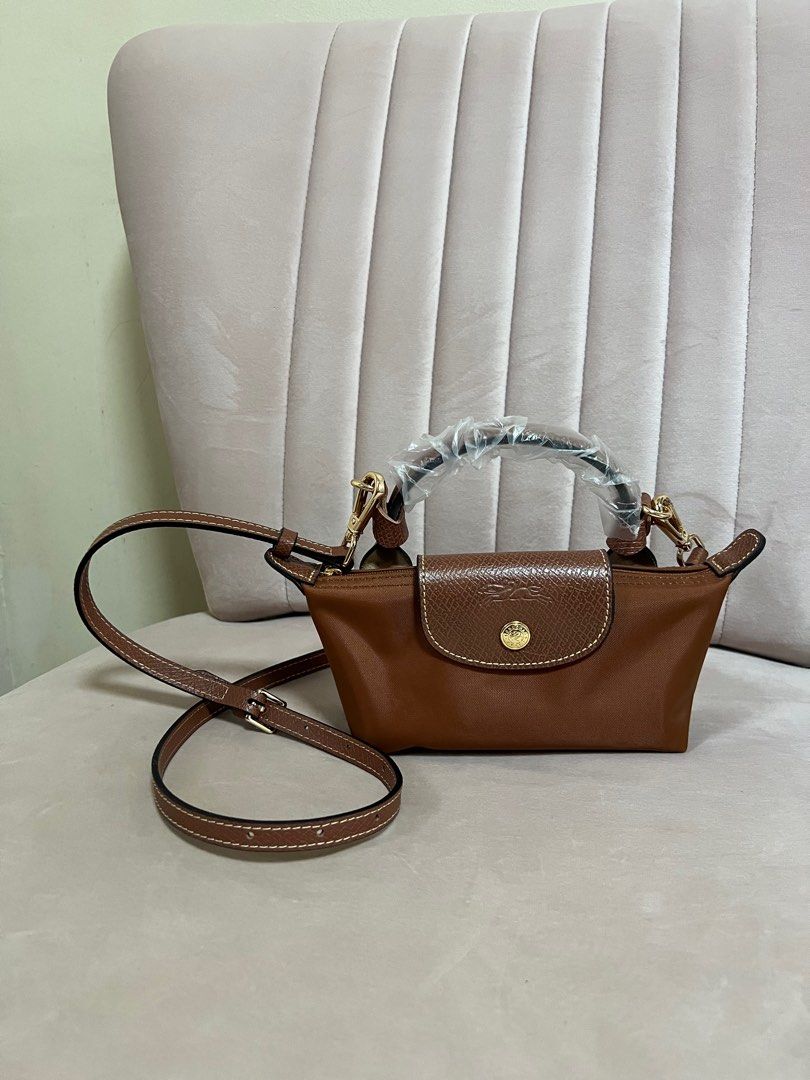 Longchamp Le Pliage Pouch with Handle in Cognac, Luxury, Bags & Wallets on  Carousell