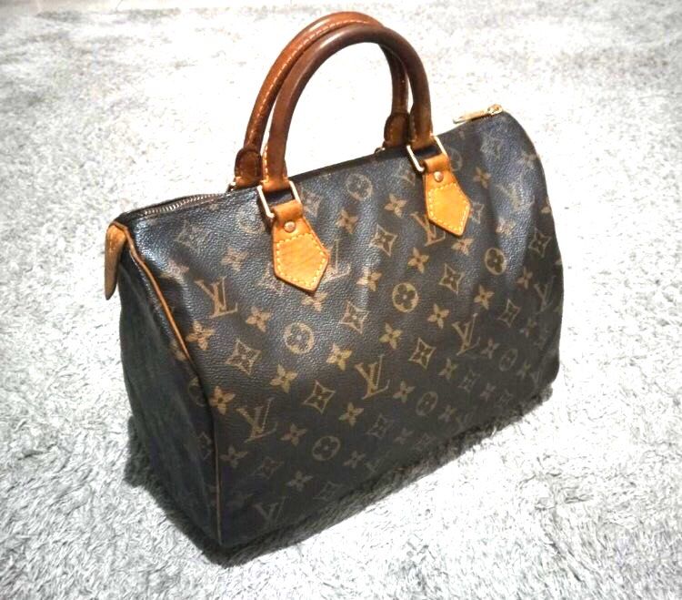 Sold at Auction: Louis Vuitton Speedy 30 Handbag - Monogram