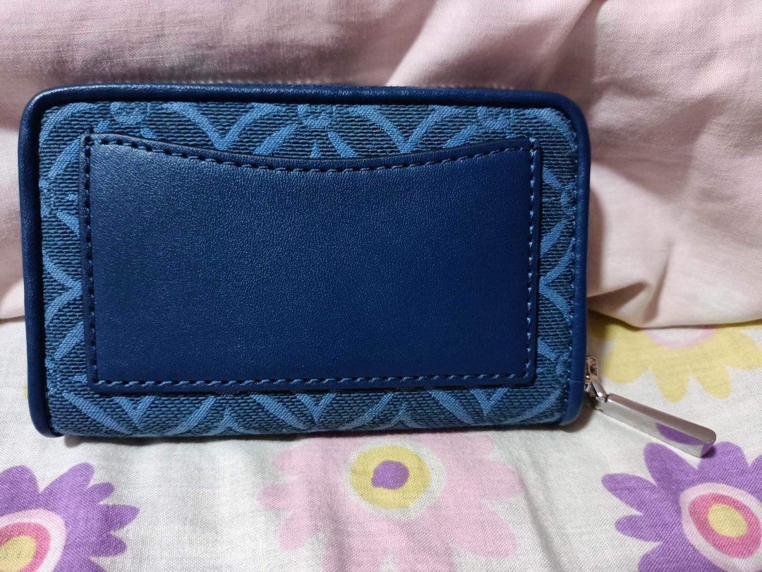 Michael Kors monogram jacquard canvas zip around card case (Category: Luxury Bags & Wallets) located in Paranaque City. Submitted by alymae27 (Listing ID 1238298291, Image 3). Description: Brand new. Length: 12 cm Width: 2cm Height: 8cm Original? Yes, it’s original..