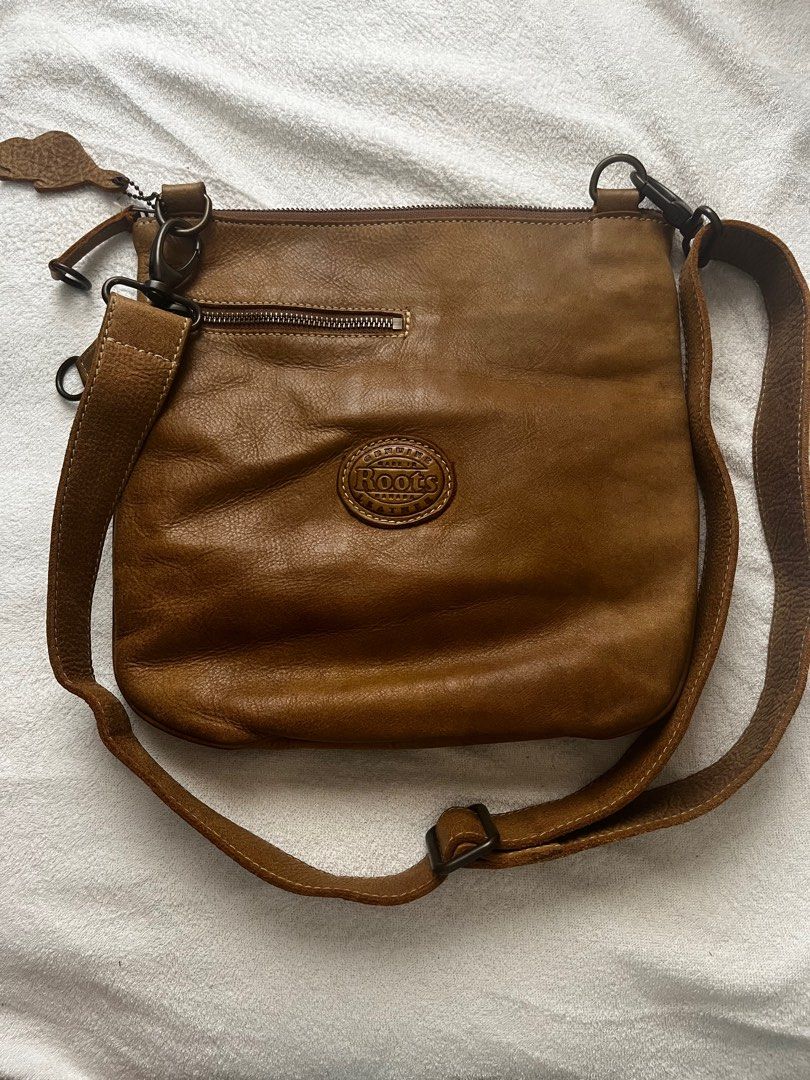 Roots sling deals bag