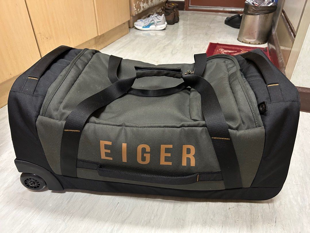 Tas Eiger Border Rolling Duffel 60L Fesyen Pria Tas Dompet
