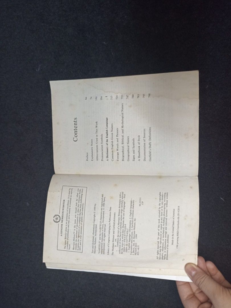 The Merriam-Webster and Garfield Dictionary w/ comics on Carousell