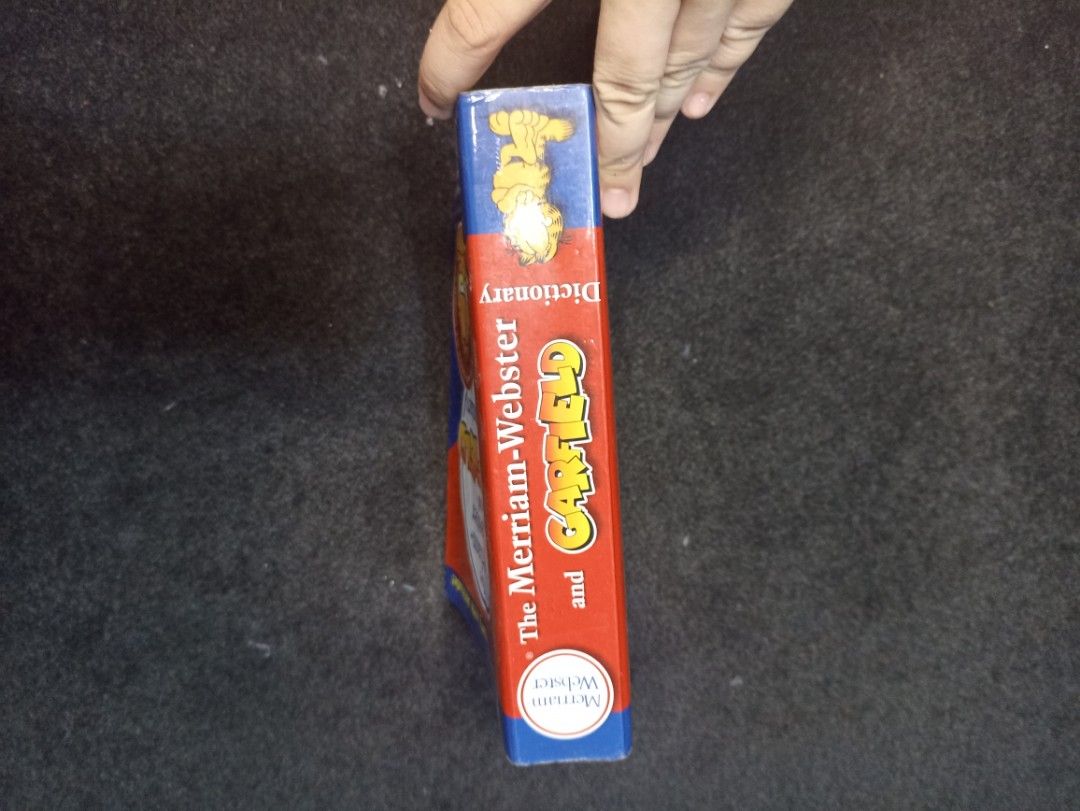 The Merriam-Webster and Garfield Dictionary w/ comics on Carousell