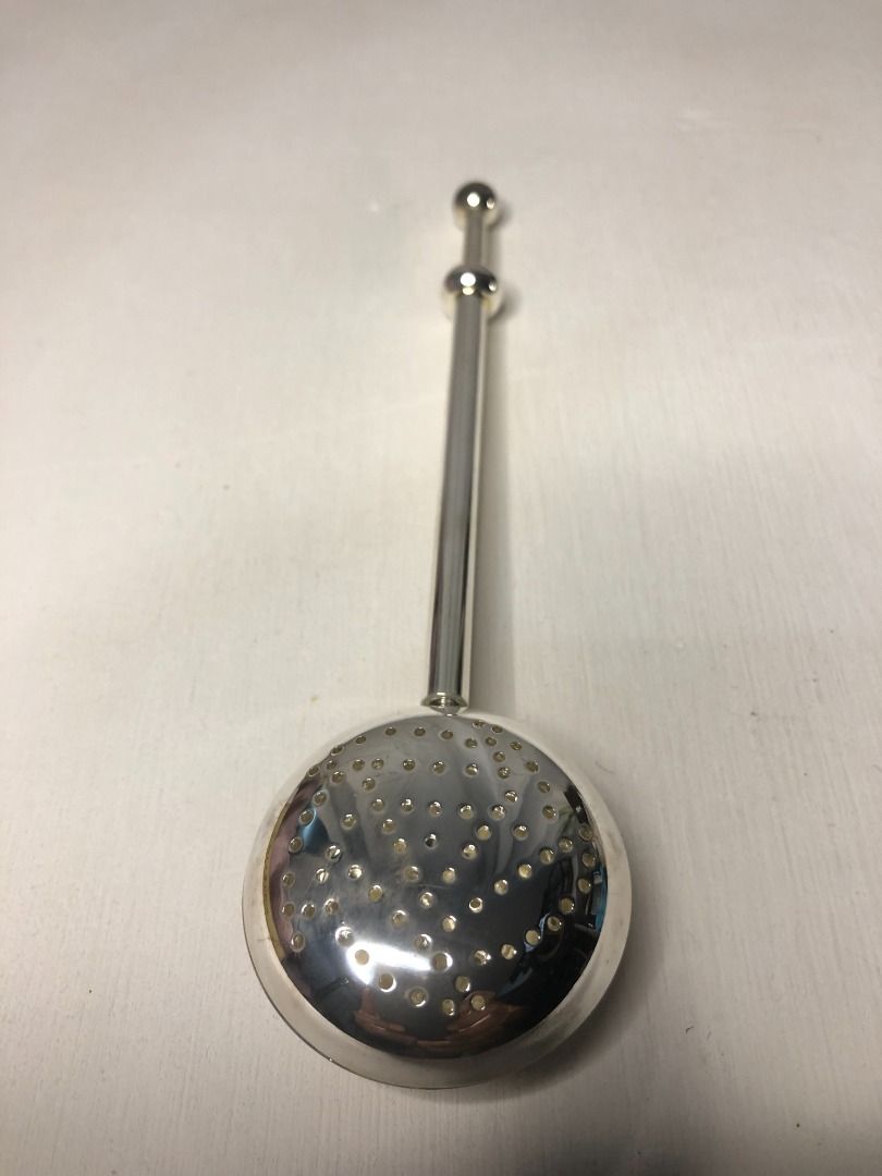 Vintage Push Handle Tea Strainer/Infuser (Category: Coffee & Tea Tableware) located in Tagaytay City. Submitted by barenwolf (Listing ID 1238304812, Image 3). Description: A Vintage Push Handle Tea Strainer/Infuser is a classic and practical way to brew loose leaf tea. Here are some features of this type of tea infuser: -Features a long handle with a push-open style ball for easy use -Suitable for medium to large tea leaves, but not suitable for 