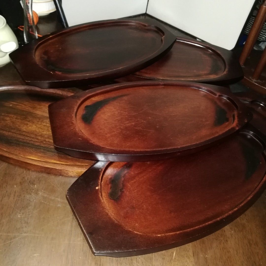 wooden base for sizzling plates (Category: Other Kitchenware & Tableware) located in Paranaque City. Submitted by 4thestate.surplusan (Listing ID 1238248241, Image 1). Description: 8pcs wooden base for rsizzling plates, usedfr japan but in good condition. size 28,cm x 15.5 cm ( inside).