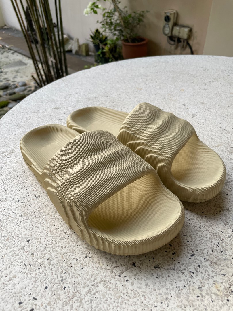 Adidas slides first on sale copy