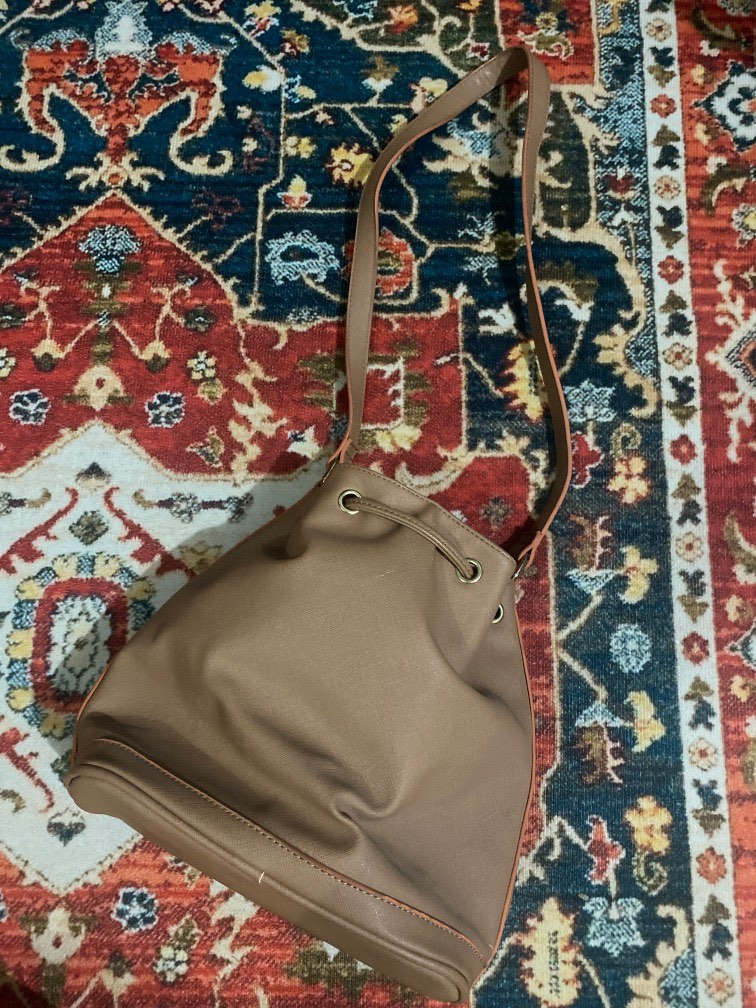 brown leather bucket bag on Carousell
