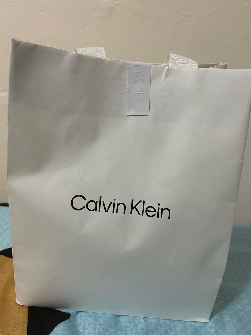 Calvin klein paper bag, Men's Fashion, Activewear on Carousell
