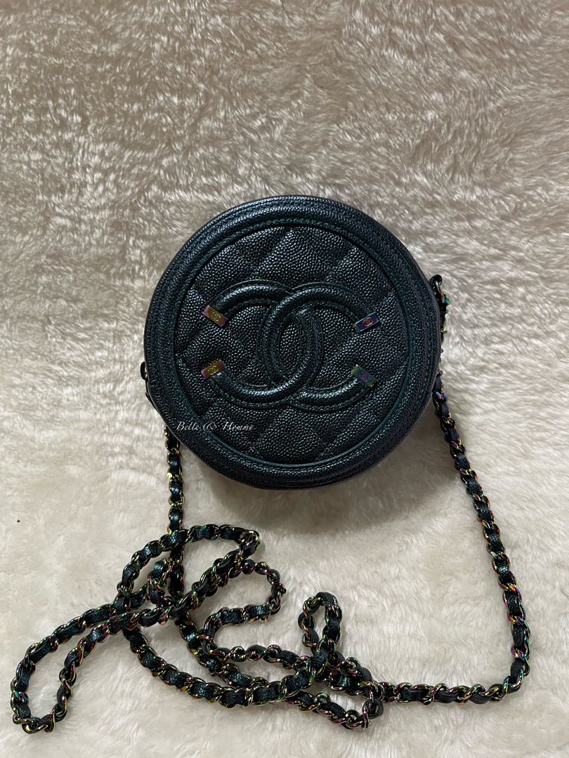 Chanel cc filigree best sale round chain clutch