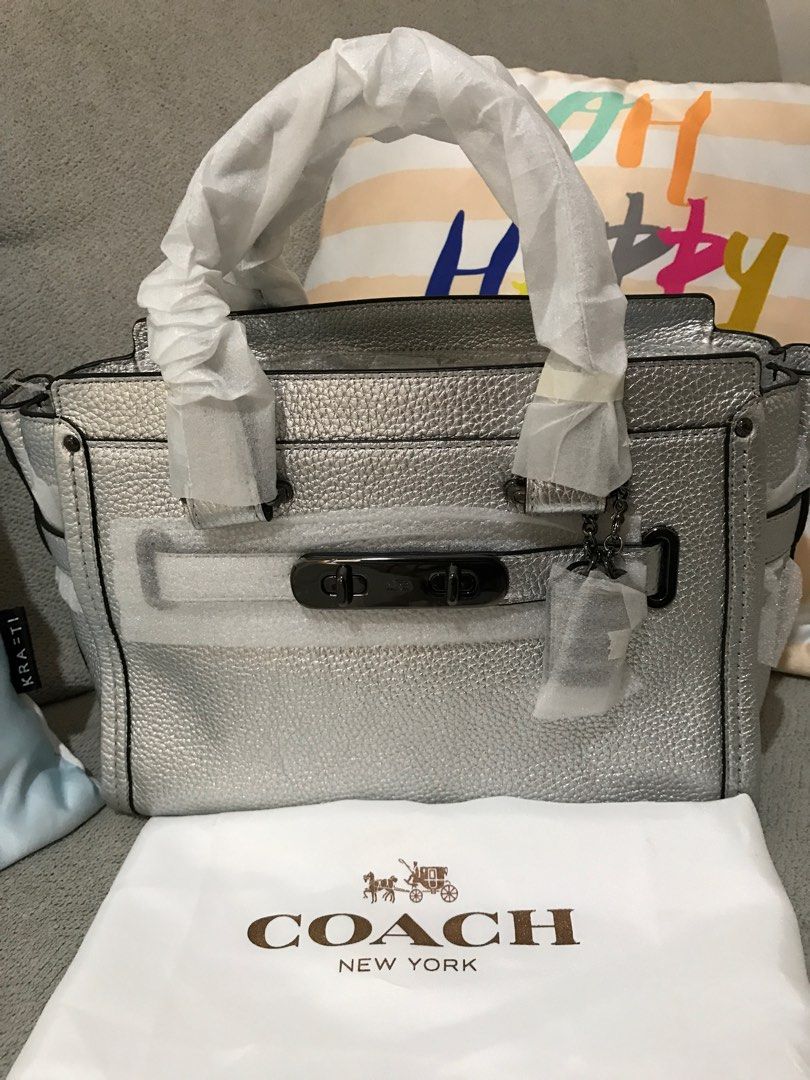 Harga coach swagger clearance