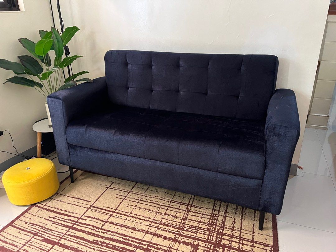 Dark Blue Fabric Covered Sofa 60 inches long (Category: Sofas) located in Paranaque City. Submitted by abby_e_g (Listing ID 1235282006, Image 2). Description: Brandnew Dark blue Wood frame Uratex Foam Black Steel Legs 6 inches only .
