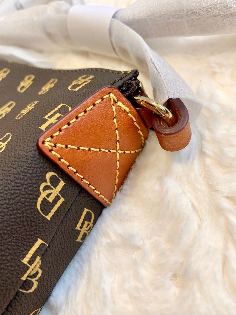 Dooney and Bourke Cross body bag (Category: Cross-body Bags) located in San Fernando. Submitted by sheydm18 (Listing ID 1235217346, Image 3). Description: Guaranteed Original Brand new Fits cellphone, wallet, powder, keys. Best On-the-Go bag! ❤️ Shipping c/o buyer available for Shopee checkout (COD for shipping only).