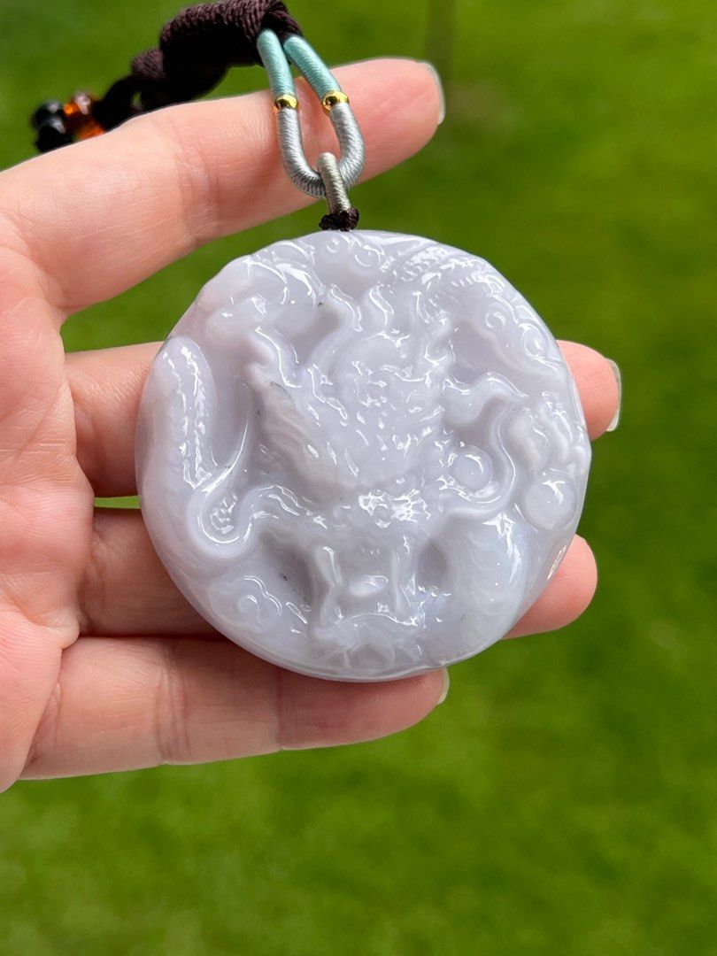 White jade dragon pendant hotsell