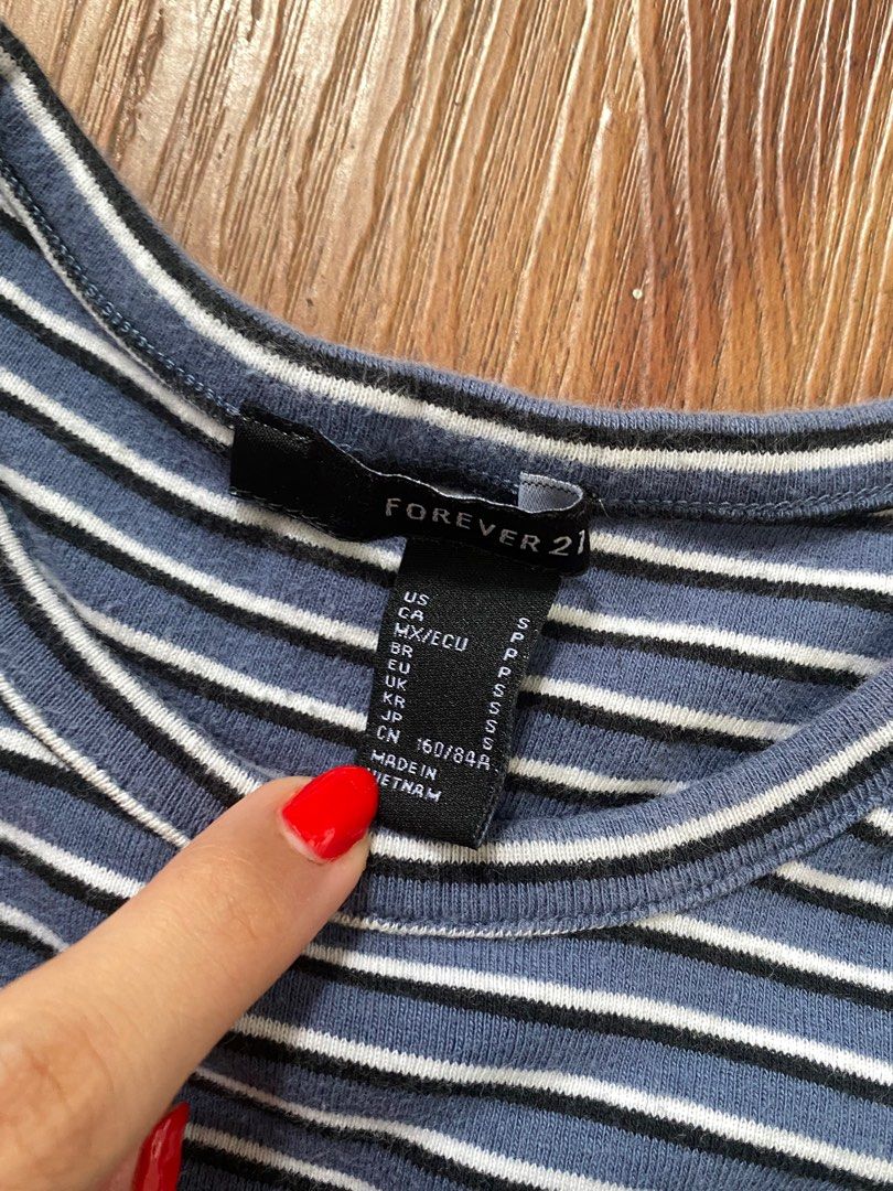Forever 21 Blue Striped Lettuce Crop Top (Category: Shirts) located in Makati City. Submitted by soobjny (Listing ID 1235207830, Image 3). Description: rfs: decluttering! :).