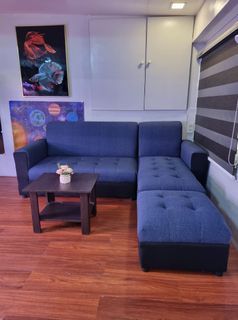 L shape blue fabric sofa with center table uratex foam