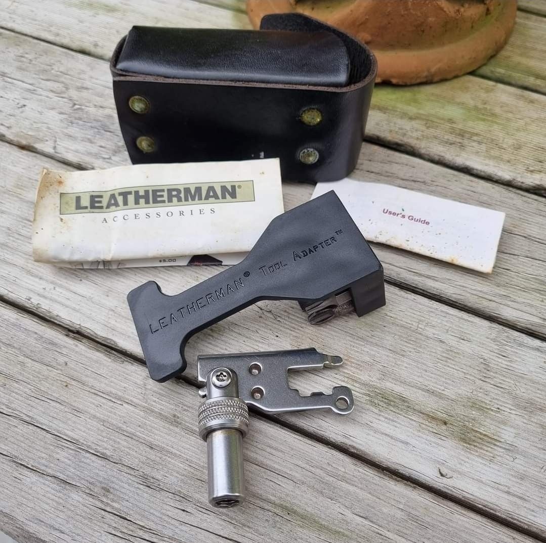 Leatherman Tool Adapter vintage (Category: Other Sports Equipment and Supplies) located in Pasig City. Submitted by chunkee1 (Listing ID 1235241907, Image 2). Description: Vintage LM Tool Adapter For original PST, PST II, Super Tool (not 200 or 300), Sideclip, Flair, Pulse and even the Mini-Tool. No date stamp on tool, indicative of pre-1998 production Unused, tool adapter is in mint conditon, stored only Mint leather sheath Complete tool set but