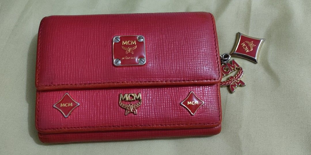 MCM wallet red orange (Category: Luxury Bags & Wallets) located in Quezon City. Submitted by prelovee19 (Listing ID 1235312876, Image 1). Description: MCM wallet 💯% Original still in good condition check pictures.