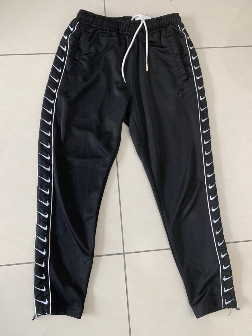 Nike clearance tape bottoms