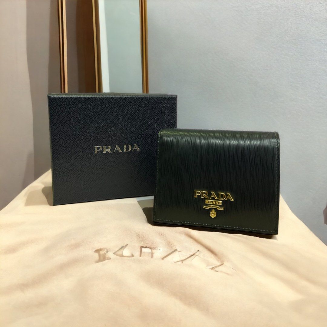 Prada wallet on chain saffiano leather, Women's Fashion, Bags & Wallets,  Purses & Pouches on Carousell