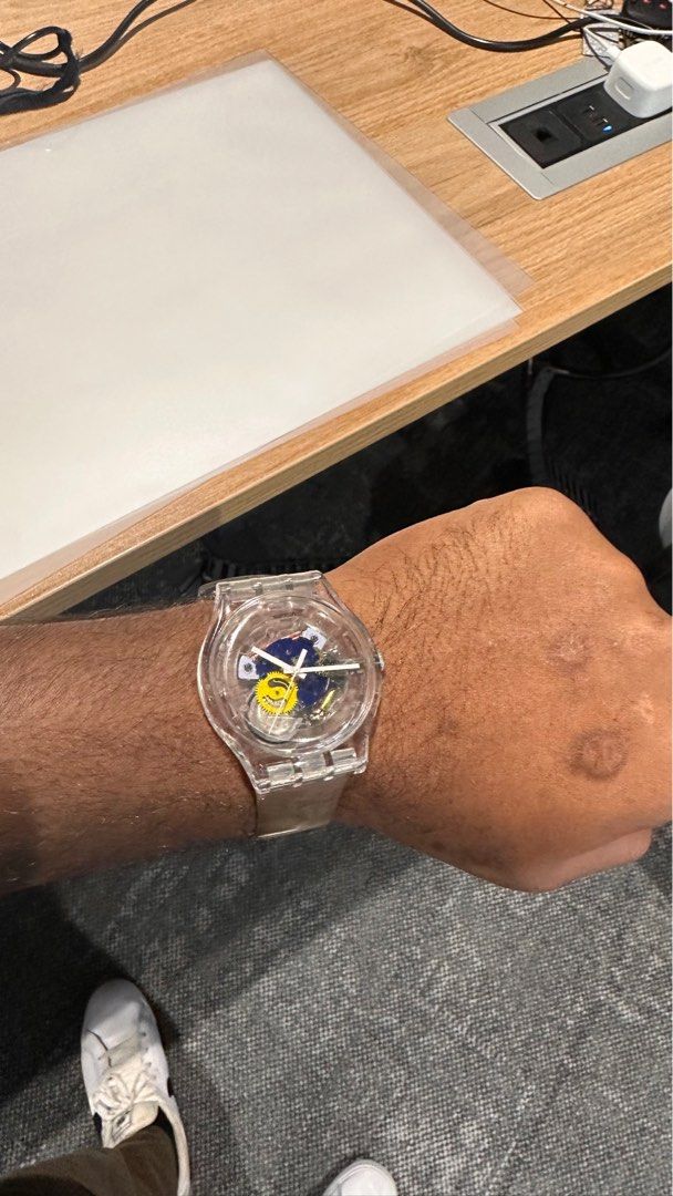 Swatch transparent sales watch price