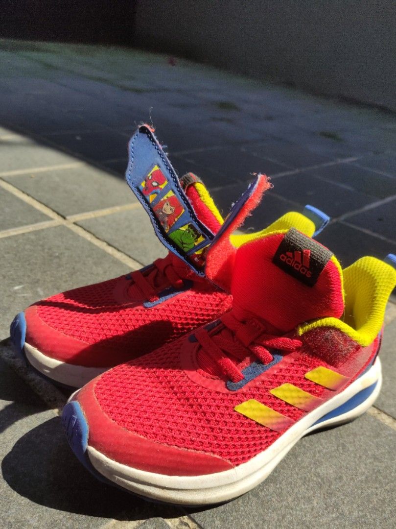 Red adidas on sale shoes youth