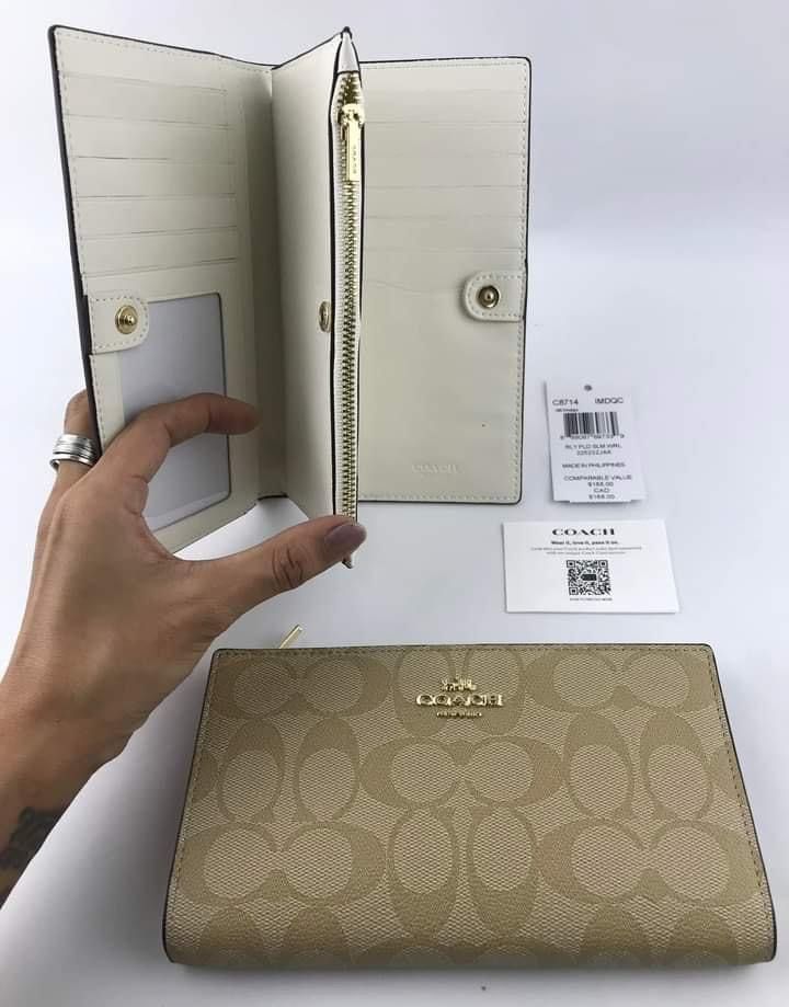 COACH slim wallet 🛍️ (Category: Luxury Bags & Wallets) located in Las Pinas. Submitted by yhn_boutique (Listing ID 1238430741, Image 2). Description: 📌Actual pic posted 📌cod via lalamove/ grab 📌J&T pay today ship today 📌 complete inclusions Please check my carouse.