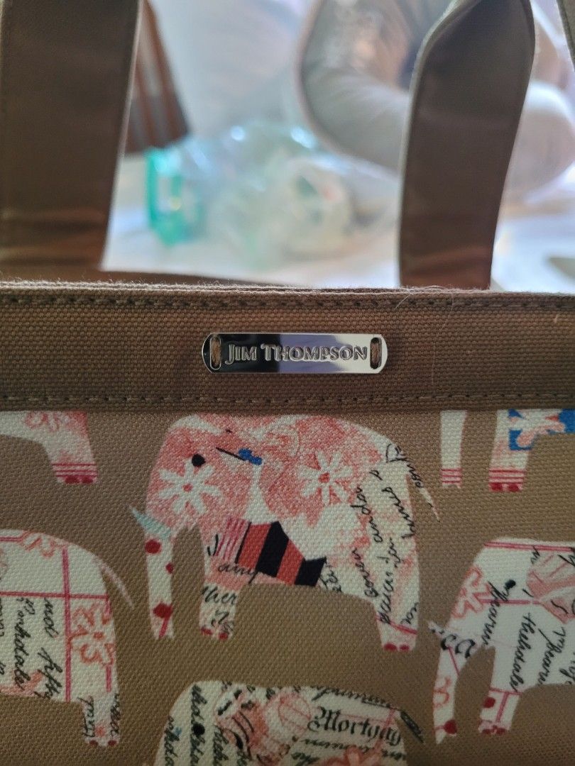 Jim Thompson designer handbag and matching change mat (Category: Changing Mats & Accessories) located in Singapore. Submitted by pistolpete (Listing ID 1238454407, Image 3). Description: Jim Thompson designer elephant print nappy handbag and matching change mat. Bought from Bangkok. Used a couple of times. Rare out of production item..