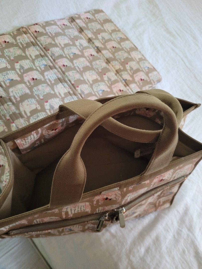 Jim Thompson designer handbag and matching change mat (Category: Changing Mats & Accessories) located in Singapore. Submitted by pistolpete (Listing ID 1238454407, Image 2). Description: Jim Thompson designer elephant print nappy handbag and matching change mat. Bought from Bangkok. Used a couple of times. Rare out of production item..