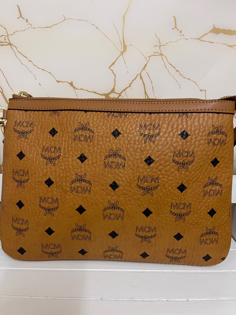 MCM clutch, Women's Fashion, Bags & Wallets, Purses & Pouches on Carousell