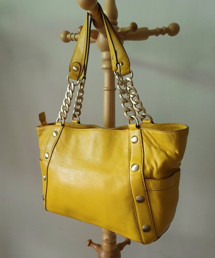 Yellow studded hotsell michael kors bag