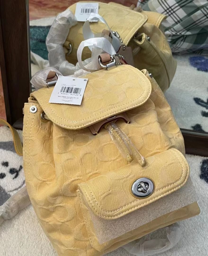 Coach yellow backpack new arrivals