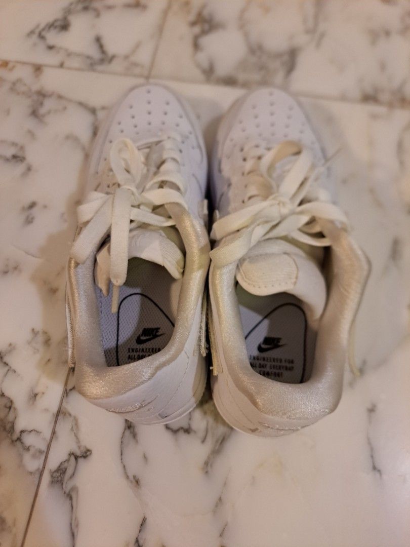 Nike shoes with changeable swoosh top