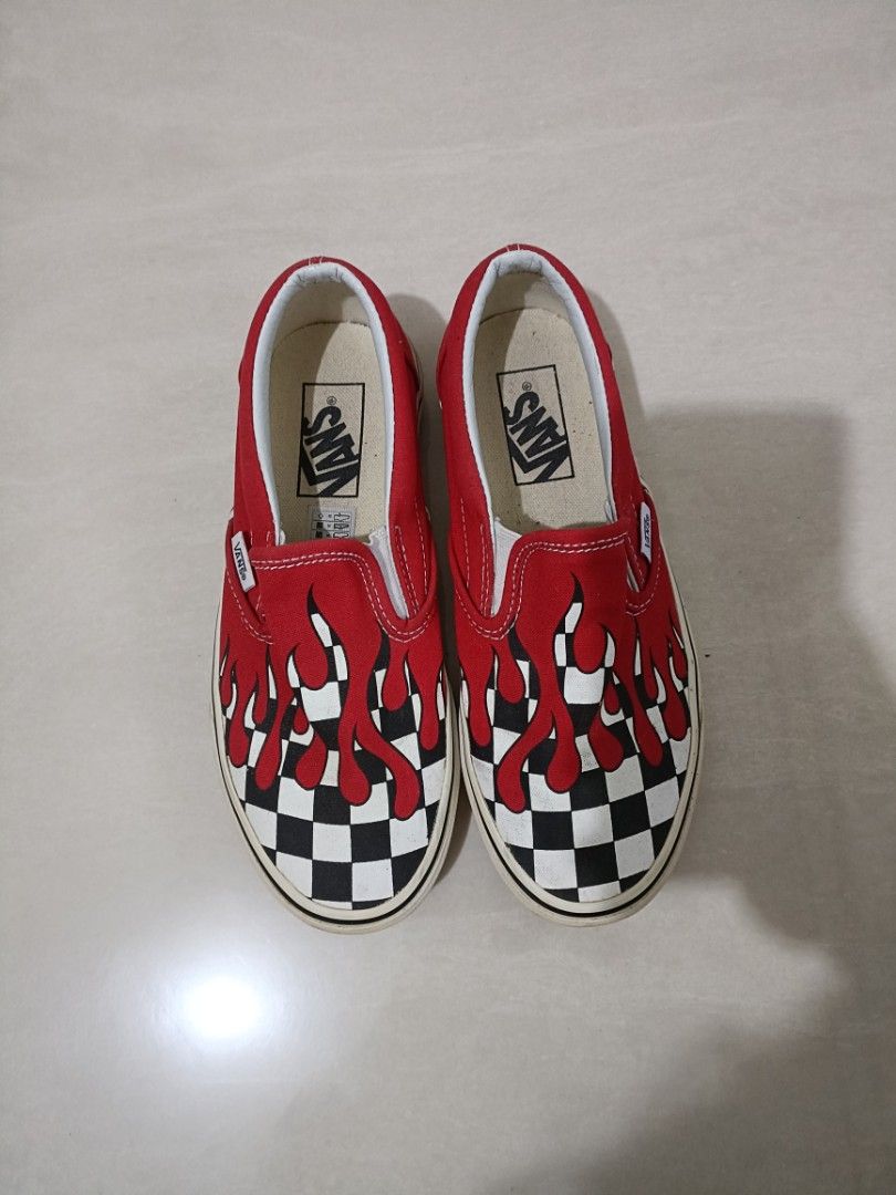 Vans slip online on flame checkerboard